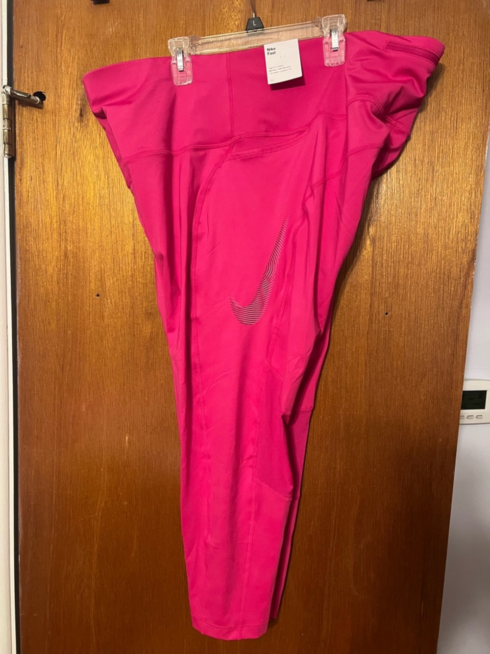 Nike Hot Pink Athletic Leggings with Reflective Swoosh